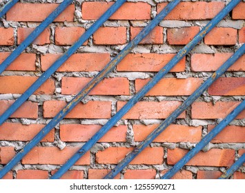 Texture Brick Wall Behind Bars