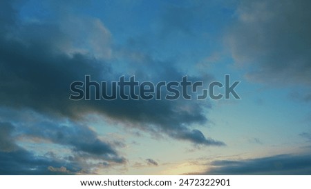 Texture of bright evening sky during sunset. Background of clouds on the burning dawn.