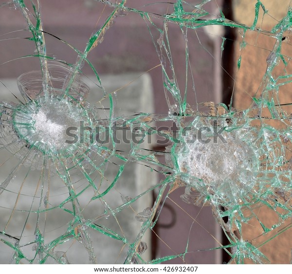 Texture of broken  cracked glass. Glass test\
impact resistance.