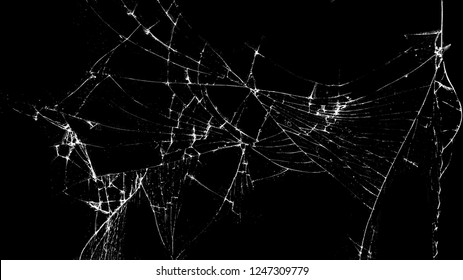 Texture Of Broken Glass On A Black Background. Concept Of Broken Automotive Glass, Screen Phone, Tablet, Laptop. Flat Lay, Top View.