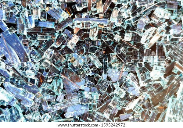 Texture of\
broken glass, shards. Abstract\
background.