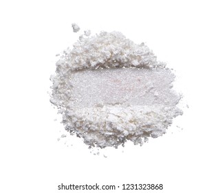 Texture of broken pearl white eye shadow isolated on white background. Macro texture of broken white powder