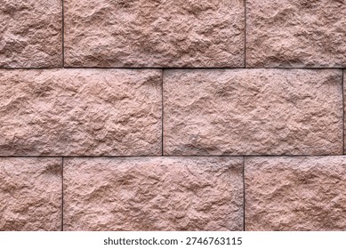 Texture of brown brick wall as background, closeup