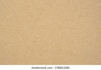 Texture of brown craft or kraft paper background, cardboard sheet, recycle paper, copy space for text. - Shutterstock ID 1780013285