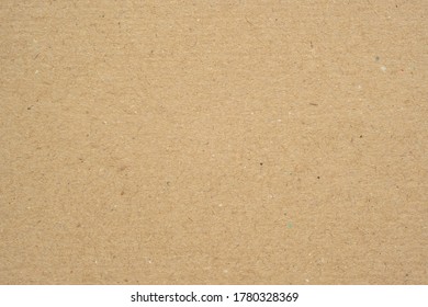 Texture of brown craft or kraft paper background, cardboard sheet, recycle paper, copy space for text. - Shutterstock ID 1780328369