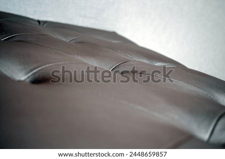 texture of brown leather quilted sofa, corner, artificial leather