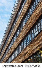 Texture Of A Building In Batumi. Tall Building With Windows In Georgia. Wood Paneling On The Building