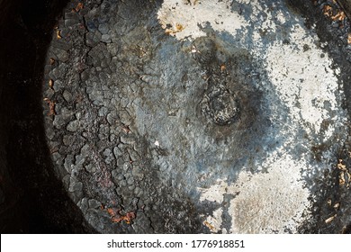 The Texture Of The Burnt Bottom Of The Cast Iron Pan