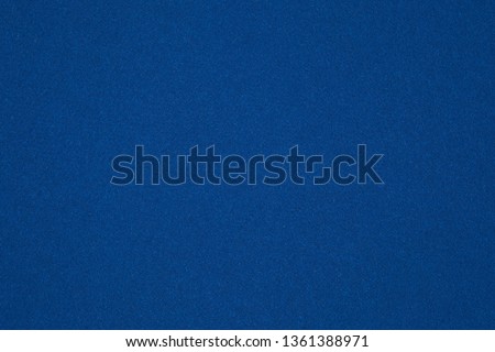 the texture of the cardboard in dark blue