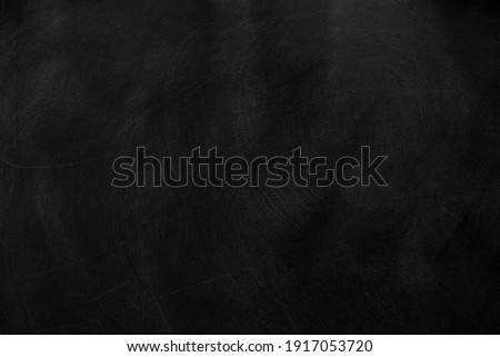 Texture of chalk on black chalkboard or blank blackboard background. School education, dark wall backdrop, template for learning board concept.