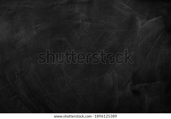 Texture of chalk on black chalkboard or blank\
blackboard background. School education, dark wall backdrop,\
template for learning board\
concept.