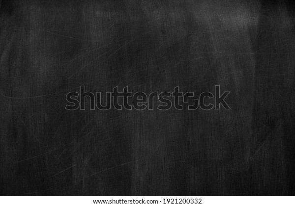 Texture of chalk on black chalkboard or blank\
blackboard background. School education, dark wall backdrop,\
template for learning board\
concept.