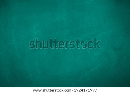 Texture of chalk on blank green blackboard or chalkboard background. School education, dark wall backdrop, template for learning board concept.