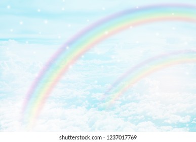 texture of cloud with double rainbow on pastel sky