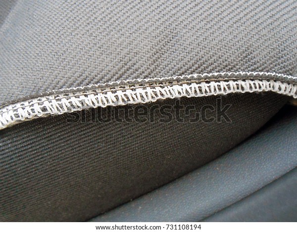 Texture coating machine seats - macro photo - seam\
on fabric