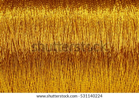Similar – Image, Stock Photo Close-up of golden yarn bundles in textile production