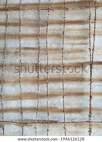 the texture of a contrived wall