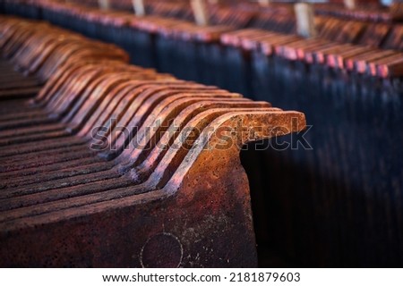 Texture of copper anode ingots in old metal melting workshop