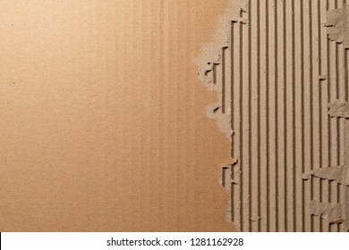 Texture Of Corrugated Cardboard With Torn Edges. Texture Cardboard Packaging. Cardboard Texture. Cardboard Mesh Background