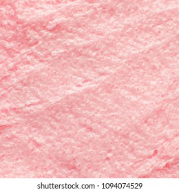 Texture Cosmetic Scrub For Face And Body Pink Sugar. Selective Focus, Trendy Punchy Pastel Background