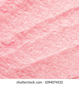 Texture Cosmetic Scrub For Face And Body Pink Sugar. Selective Focus, Trendy Punchy Pastel Background