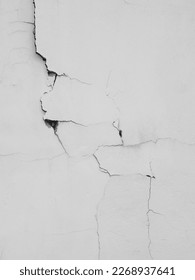 texture of the crack on white concrete wall from earthquake effect