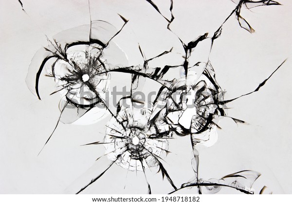 Texture of\
cracked broken glass on a white\
background