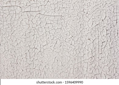 texture cracked paint like a shell. Such a beautiful cracked paint is very reminiscent of beautiful Easter eggs and gifts. Easter white texture with gray and brown veins