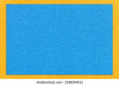 Texture of craft light blue color paper background with yellow border, macro. Structure of vintage dense kraft cerulean cardboard with empty frame. Backdrop with copy space. - Shutterstock ID 2188594911