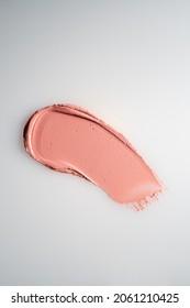 The Texture Of Cream Blush On A White Background.