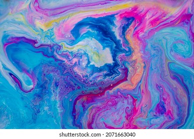 Texture created with acrylic paint of varied and vibrant colors ideal for backgrounds and graphic design