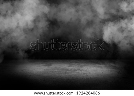 Texture dark concentrate floor with mist or fog. Black, dark and gray abstract cement wall and studio room , interior texture for display products