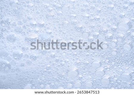 The texture of dense foam with bubbles.