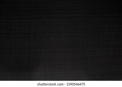 Texture of diagonal and rectangular metal lattice fine weave lattice on black background