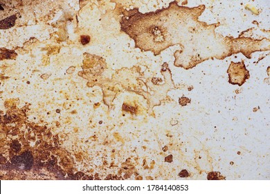 Texture of dirty stains and grease on white stove. Spots of fat on a white background - Shutterstock ID 1784140853