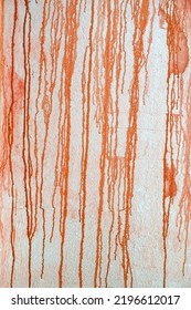 Texture of down flows of orange paint dripping down the wall. Creative background, abstract design element, copy space - Shutterstock ID 2196612017