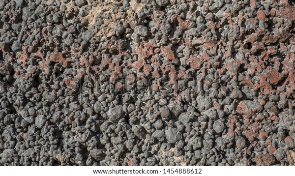 texture of extraterrestrial porous stone background,\
black wall