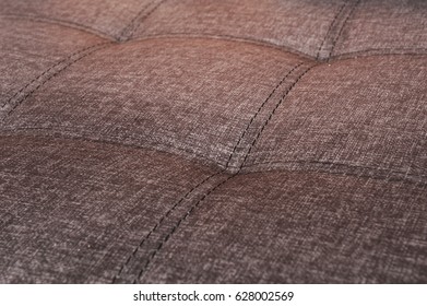 Texture of the fabric with seams. Close-up. Brown-beige color - Shutterstock ID 628002569