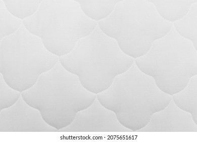 Texture fabric white mattress for bed, top view. abstract white texture of the mattress bed pattern background.