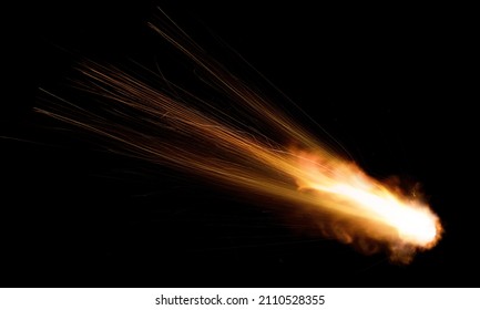 Texture Of A Falling Comet With Sparks, Smoke And A Trail Of Particles, Isolated On A Black Background