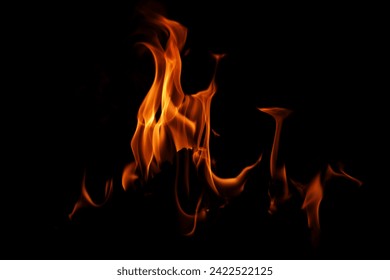 Texture of fire on black background. Abstract fire flame background. Large burning fire. Blaze fire flame texture background