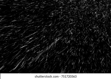The Texture Of The Flying Snow On A Black Background