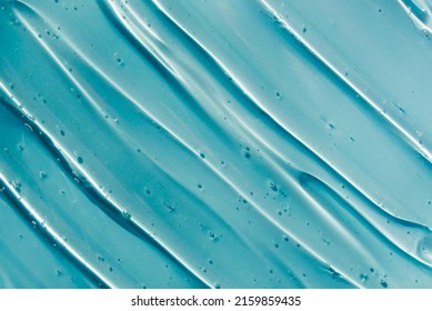 texture gel serum on blue background - Shutterstock ID 2159859435