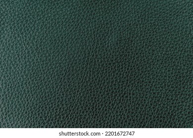 Texture Of Genuine Leather Very Dark Green Color, Background, Surface. Manufacturing And Leather Industry Concept