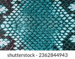 Texture of genuine matte rough leather close-up, imitation of exotic reptile, fashion green mint color, modern background, copy space