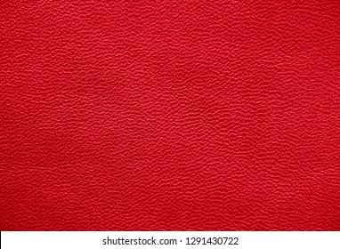 Texture of genuine red leather - Shutterstock ID 1291430722