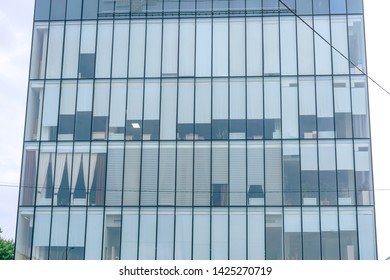 The texture of the glass building in Shymkent. Office building in Kazakhstan. Bank building in the city center
