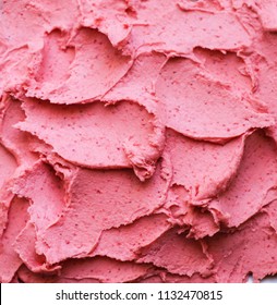 Texture of ice cream with strawberries and raspberries 