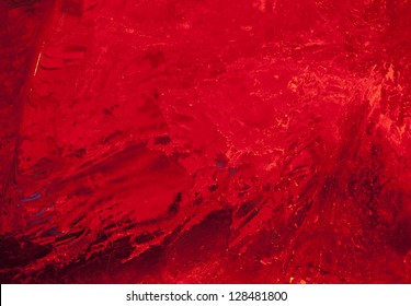 Texture Of Ice  With Dark Red Back Light. Abstract Background.