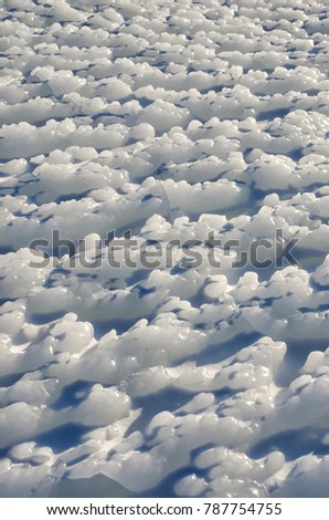 texture of ice on blue background